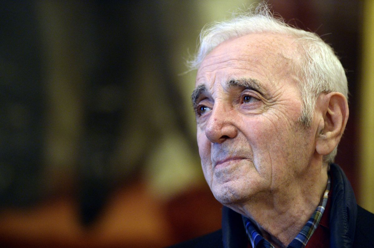 French and Armenian singer Charles Aznavour looks on during a ceremony in his honour at the Senate in Brussels, on Novenber 16, 2015. AFP PHOTO / BELGA / ERIC LALMAND
= Belgium Out = (Photo by ERIC LALMAND / BELGA / AFP)