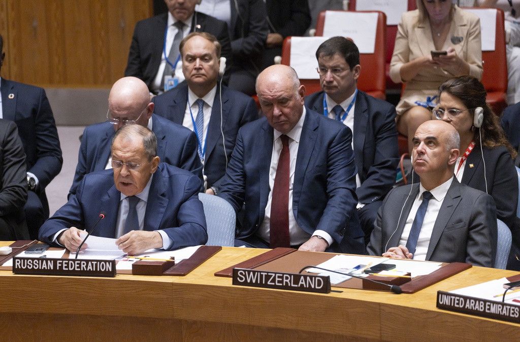 epa10872517 Russia's Foreign Minister Sergey Lavrov (L) speaks as Switzerland's President Alain Berset (R) listens during an United Nations Security Council meeting attended by Ukraine's President Volodymyr Zelensky about the war between Ukraine and Russia on the sidelines of the 78th session of the United Nations General Assembly at United Nations Headquarters in New York, New York, USA, 20 September 2023. EPA/JUSTIN LANE