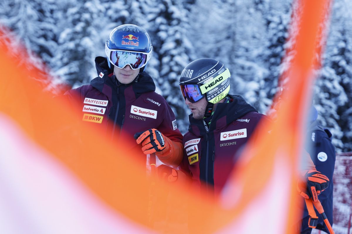 VAL GARDENA, ITALY - DECEMBER 14: Marco Odermatt and Justin Murisier of Team Switzerland inspect the course during the Audi FIS Alpine Ski World Cup Men's Downhill on December 14, 2023 in Val Gardena, Italy. (Photo by Alexis Boichard/Agence Zoom/Getty Images)