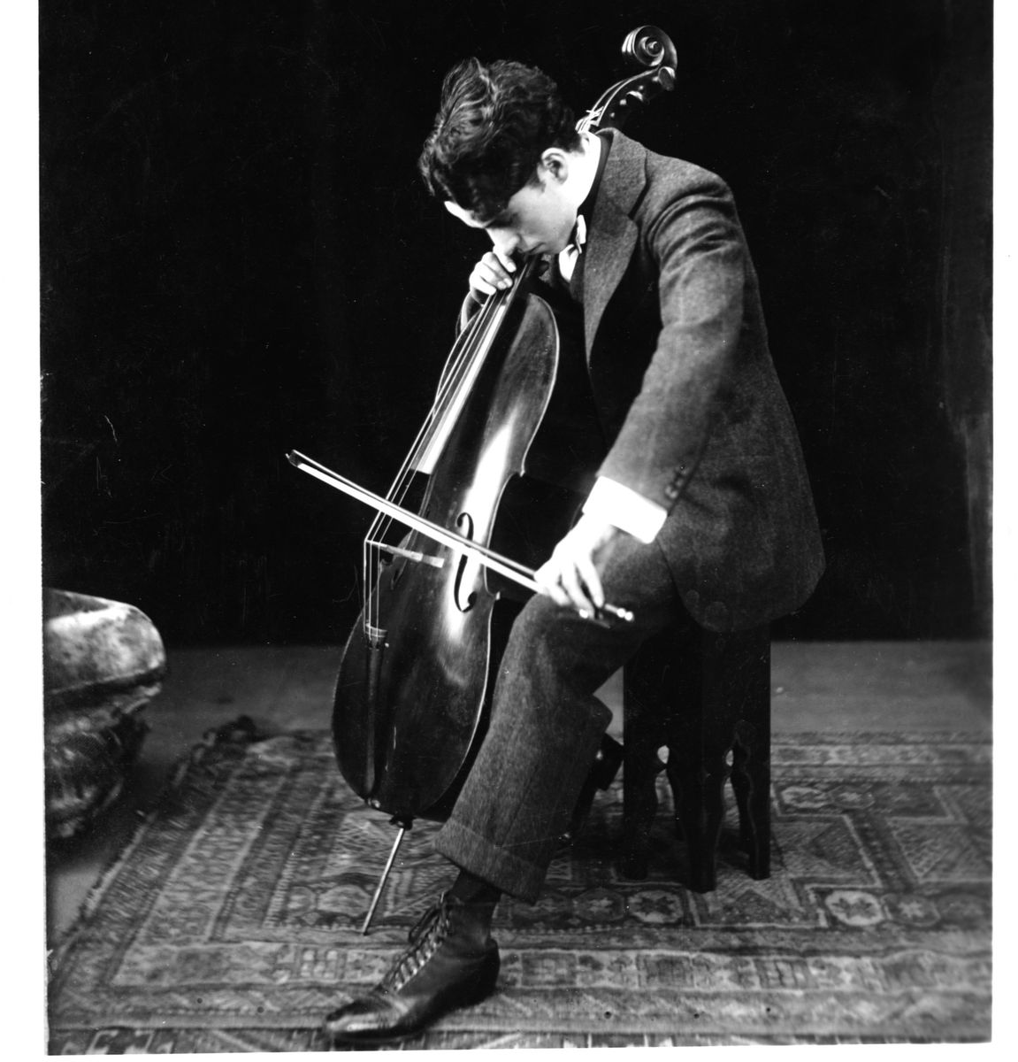 Charlie Chaplin Playing Cello   (Photo by Library of Congress/Corbis/VCG via Getty Images)