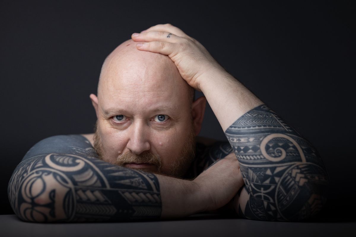 French comics artist Emmanuel Larcenet aka Manu Larcenet, poses during a photo session in Paris, on March 26, 2024. (Photo by JOEL SAGET / AFP)