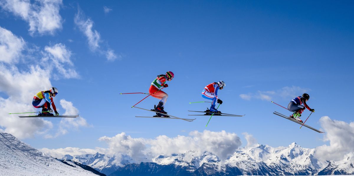 Stephanie Joffroy of Chile, Saskja Lack of Switzerland, Marielle Berger of France and Tiana Gairns of Canada in action during the 1/4 final of the women's Ski Cross event at the FIS Ski Cross, SX, World Cup, in Veysonnaz, Switzerland, Saturday, March 16, 2024. (KEYSTONE/Jean-Christophe Bott)