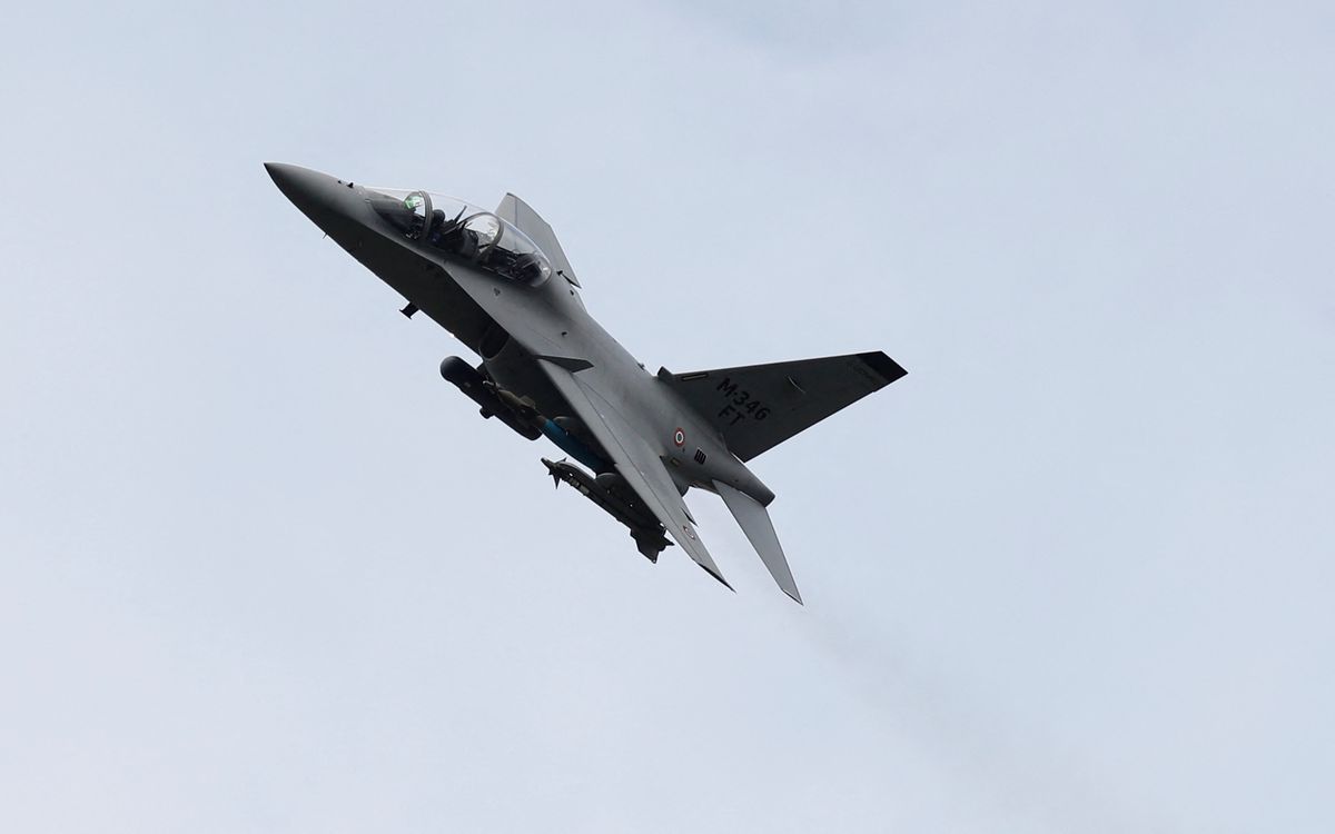 The Alenia Aermacchi M-346 Master, military twin-engine transonic trainer aircraft takes part in a flying display at the Farnborough Airshow, south west of London, on July 12, 2016. (Photo by ADRIAN DENNIS / AFP)