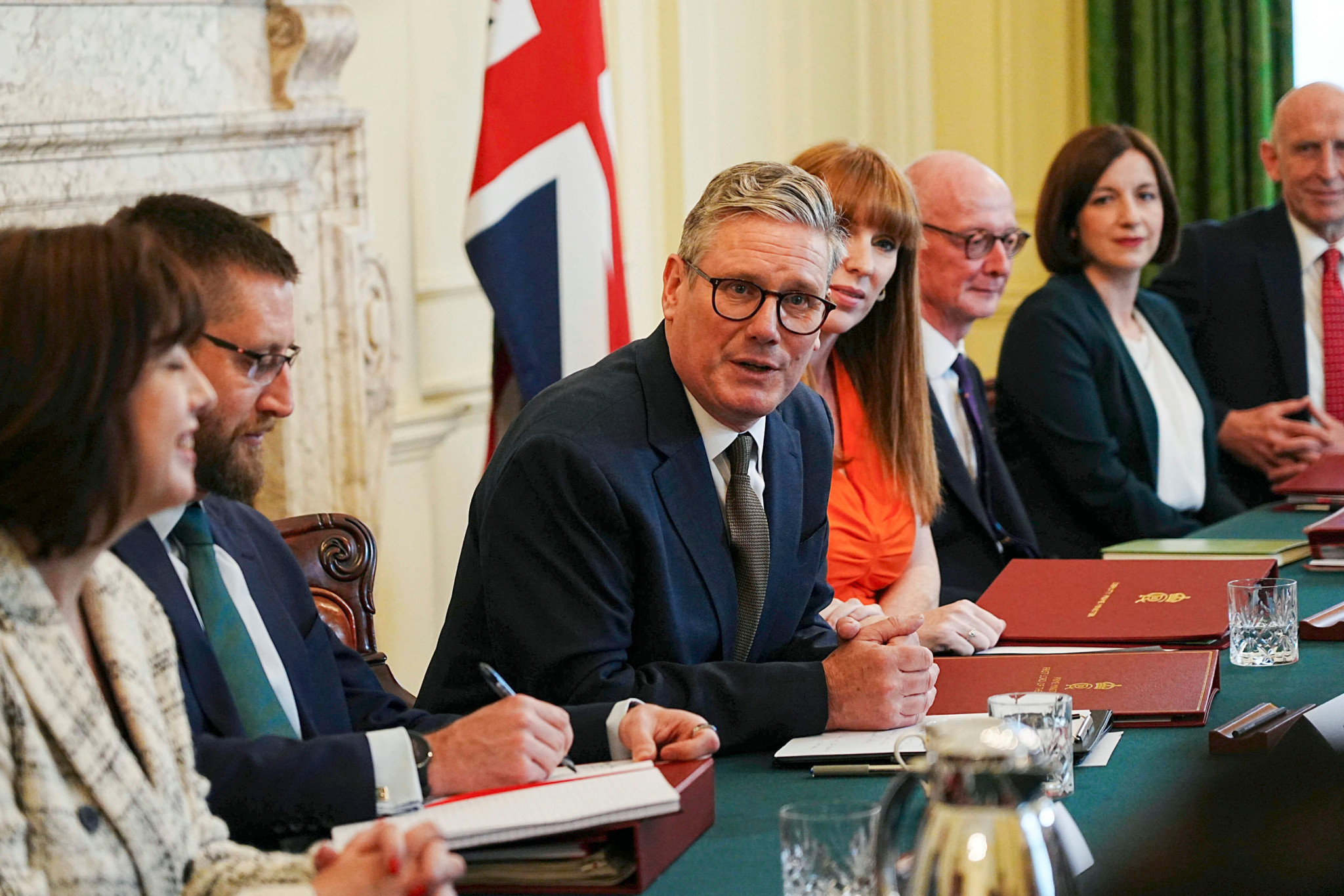 Britain's Prime Minister Keir Starmer, center, with Deputy Prime Minister Angela Rayner, center right, hosts his first Cabinet meeting at 10 Downing Street, London, Saturday July 6, 2024. following the General Election victory for the Labour Party. (Chris Eades/Pool via AP)