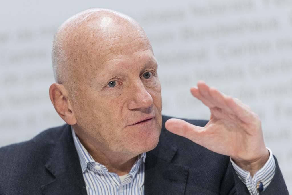 People stand at a high pont looking down at the flood waters in Sanliurfa, southeastern Turkey on March 15, 2023. - Flash floods killed at least 10 people living in tents and containers set up across Turkey's quake-hit southeast on March 15, 2023, according to media reports, with at least five people killed and another five missing in Adiyaman and Sanliurfa. (Photo by Demiroren News AAgency / DHA (Demiroren News Agency) / AFP) / - Turkey OUT / RESTRICTED TO EDITORIAL USE - MANDATORY CREDIT "AFP PHOTO / DHA (Demiroren News Agency) " - NO MARKETING - NO ADVERTISING CAMPAIGNS - DISTRIBUTED AS A SERVICE TO CLIENTS