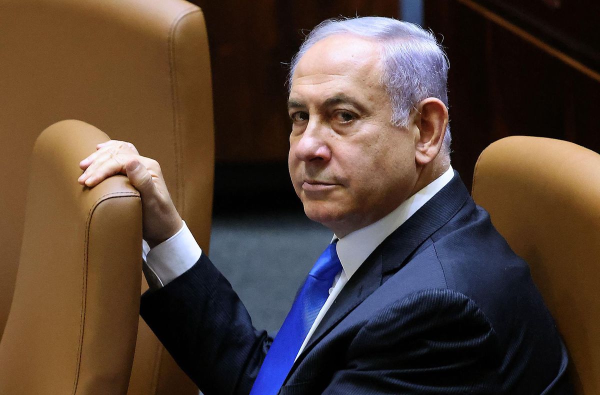 Israel's Prime Minister Benjamin Netanyahu attends a special session to vote on a new government at the Knesset in Jerusalem, on June 13, 2021. - A delicate eight-party alliance united by animosity for Netanyahu is poised to take over with right-wing Naftali Bennett as prime minister, if the coalition deal passes today's slated parliamentary vote. (Photo by EMMANUEL DUNAND / AFP)