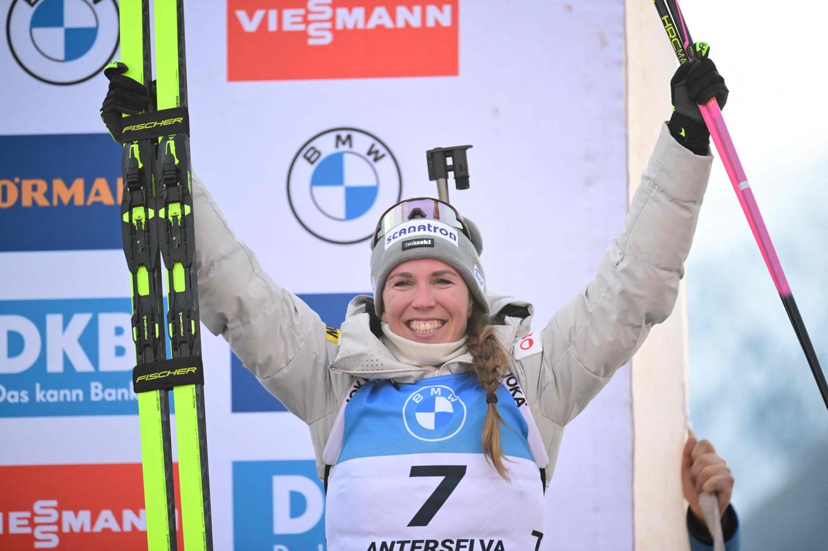 Third placed, Switzerland's Lena Haecki-Gross celebrates on the podium of the women's 12.5km mass start event of the IBU Biathlon World Cup in Antholz-Anterselva, Italy, on January 21, 2024. (Photo by Marco BERTORELLO / AFP)