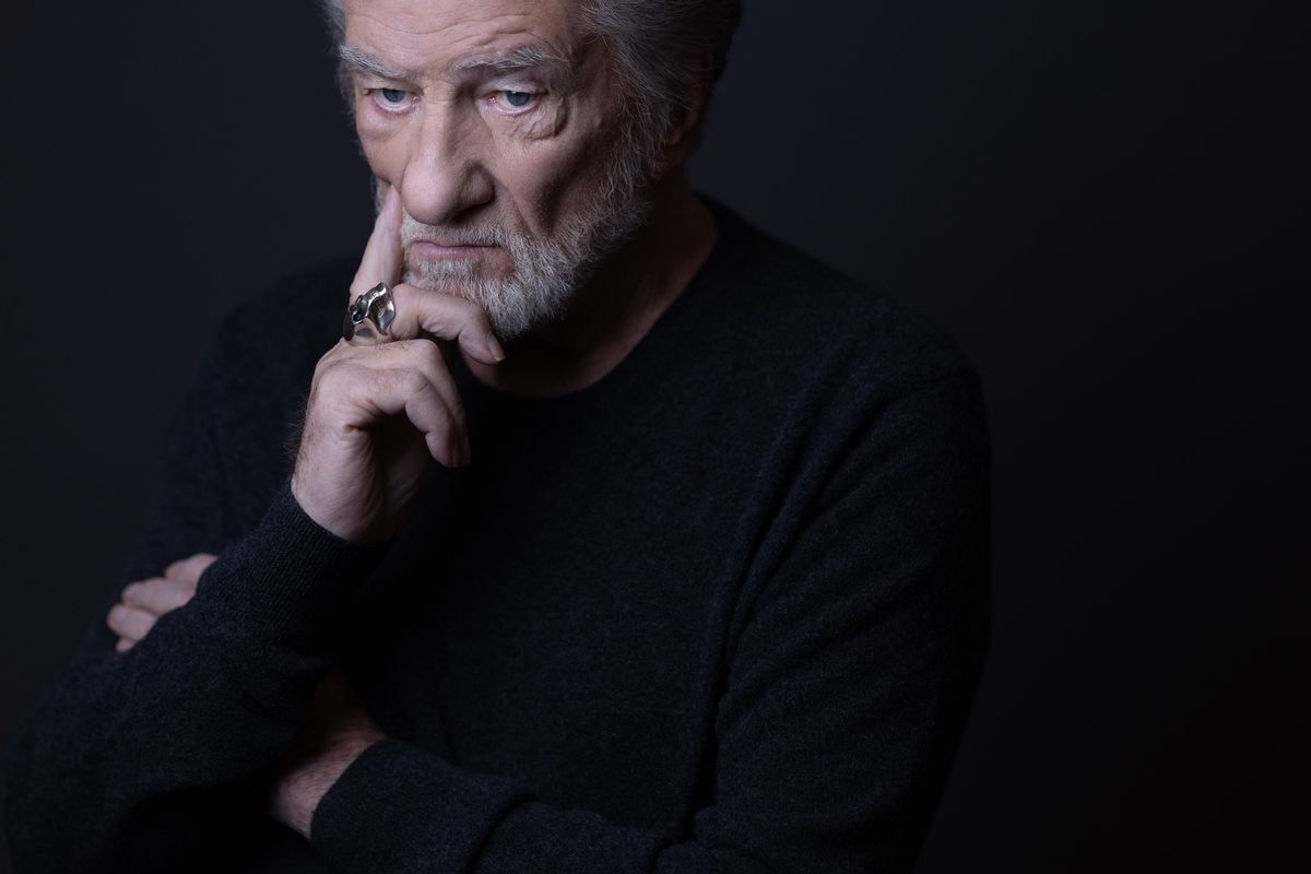French singer Eddy Mitchell poses during a photo session in Paris, on November 27, 2024. (Photo by JOEL SAGET / AFP)