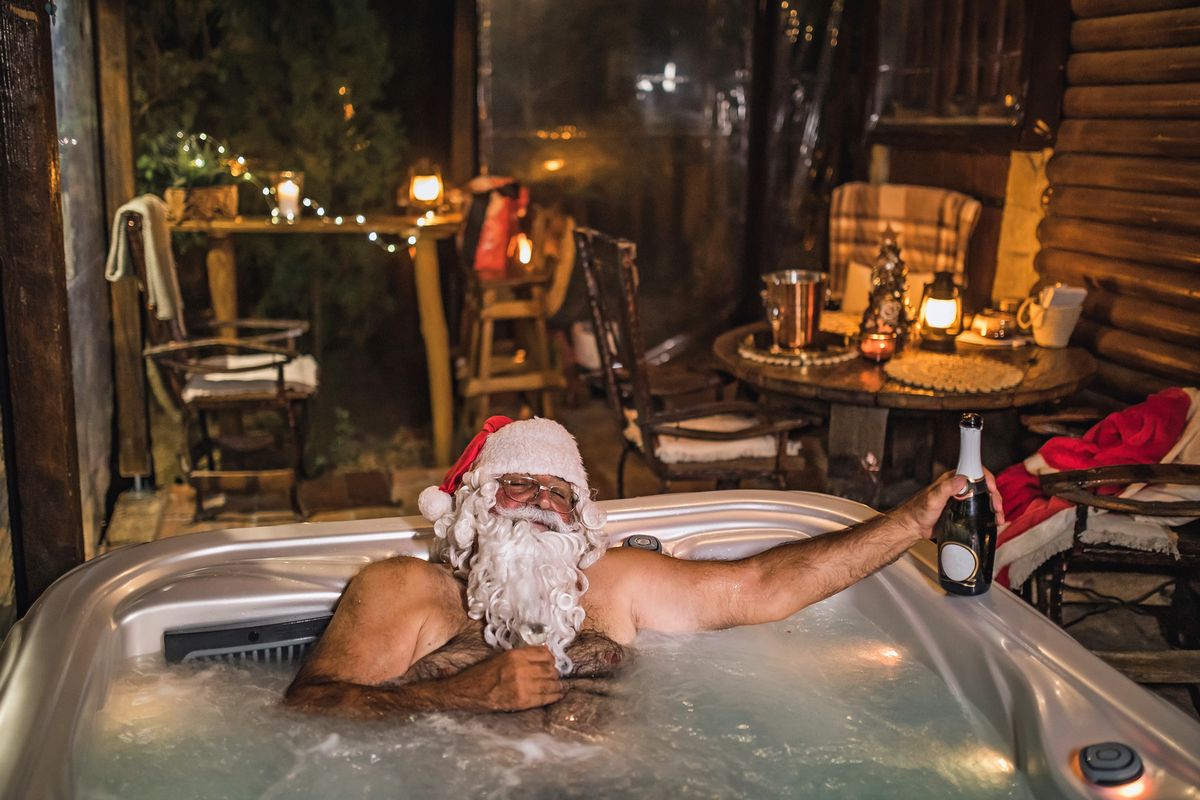 Santa uses the hot tub to relax.