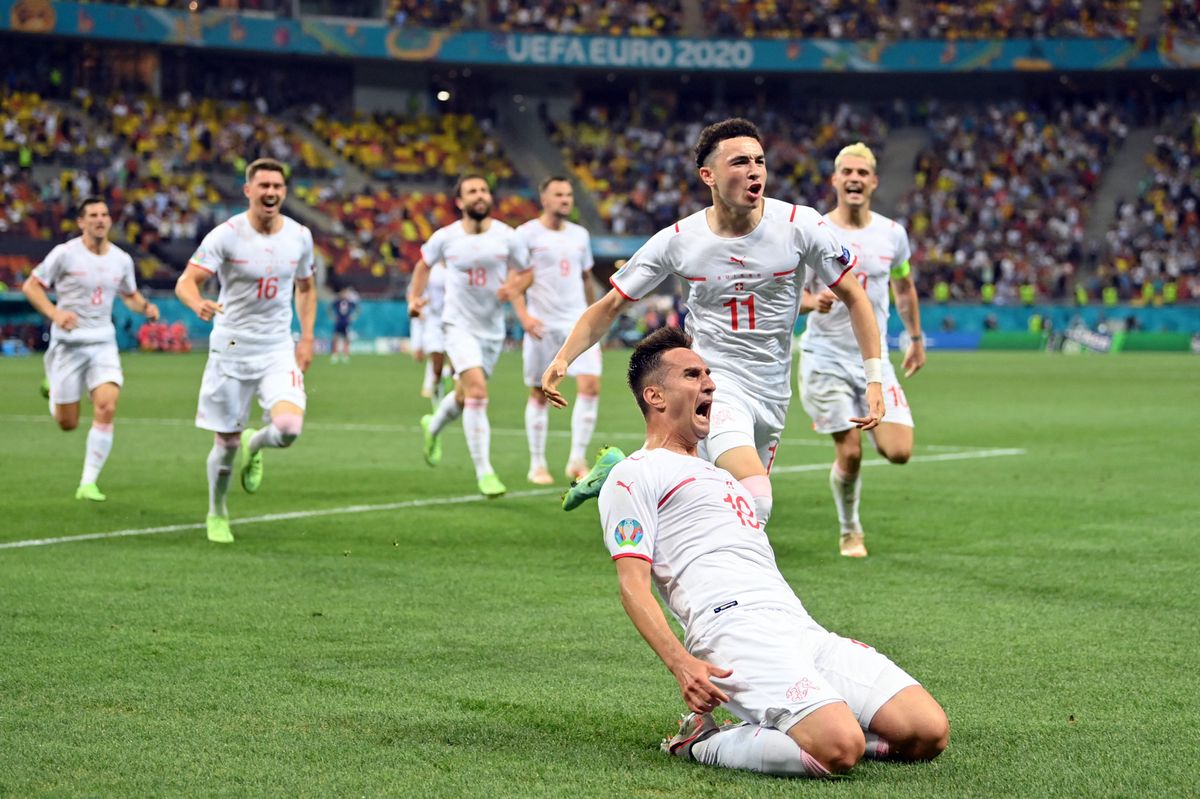 Switzerland's forward Mario Gavranovic celebrates scoring the team's third goal during the UEFA EURO 2020 round of 16 football match between France and Switzerland at the National Arena in Bucharest on June 28, 2021. (Photo by Justin Setterfield / POOL / AFP)