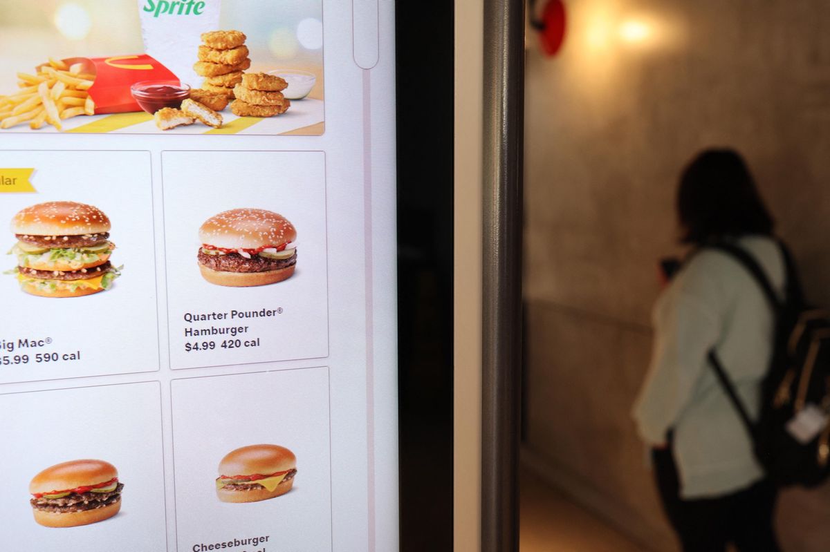NEW YORK, NEW YORK - OCTOBER 23: A Quarter Pounder hamburger is seen on a menu at a McDonald's on October 23, 2024 in the Flatbush neighborhood in the Brooklyn borough of New York City. Federal health officials announced that at least 49 people in 10 states have become sick from E. coli food poisoning linked to McDonald’s Quarter Pounder hamburgers. Ten people were hospitalized and one person has died after becoming sick. Infections were reported between September 27th and October 11th in states including Colorado, Iowa, Kansas, Missouri, Montana, Nebraska, Oregon, Utah, Wisconsin and Wyoming.   Michael M. Santiago/Getty Images/AFP (Photo by Michael M. Santiago / GETTY IMAGES NORTH AMERICA / Getty Images via AFP)