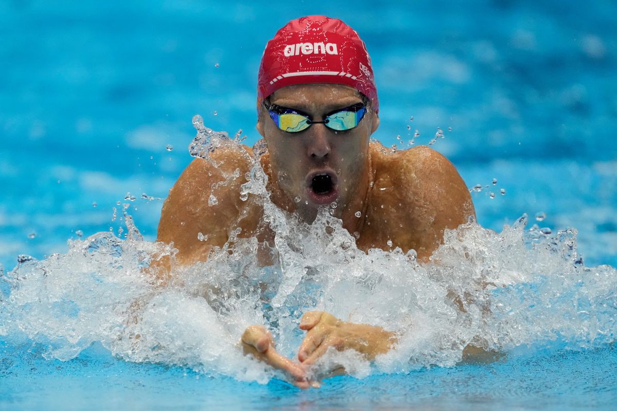 Jeremy Desplanches of Switzerland competes during the men's 100m medley relay heat at the World Swimming Championships in Fukuoka, Japan, Sunday, July 30, 2023. (AP Photo/Lee Jin-man)