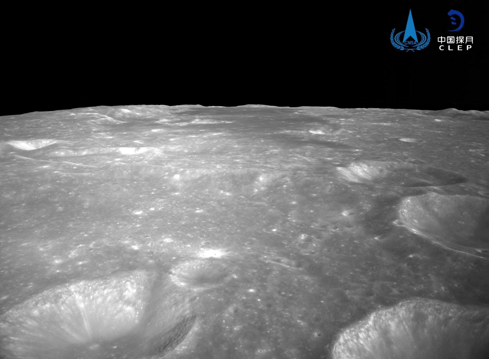 TOPSHOT - This undated handout photo taken by the China National Space Administration (CNSA) and released on June 4, 2024 shows a general view of craters on the surface of the moon captured by China's Chang’e-6 lunar probe. A module of a Chinese lunar probe successfully took off from the far side of the Moon on June 4 carrying samples to be taken back to Earth, state media reported. (Photo by Handout / China National Space Administration / AFP) / RESTRICTED TO EDITORIAL USE - MANDATORY CREDIT "AFP PHOTO / CNSA" - NO MARKETING NO ADVERTISING CAMPAIGNS - DISTRIBUTED AS A SERVICE TO CLIENTS