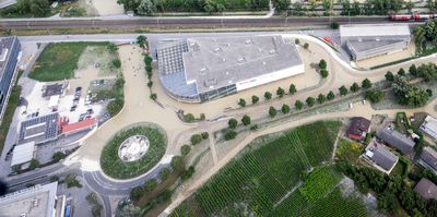 The Rhone River is overflowing at the Noes station and SBB train and the road and the A9 motorway tracks following the storms that caused major flooding, in Sierre, Switzerland, Sunday, June 30, 2024. (KEYSTONE/OLIVIER MAIRE)