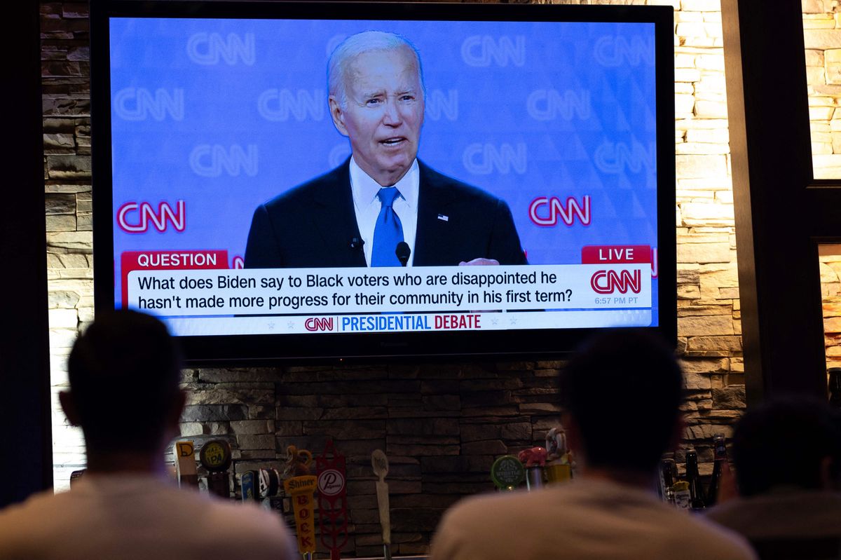 CHICAGO, ILLINOIS - JUNE 27: Guests at the Old Town Pour House watch a debate between President Joe Biden and presumptive Republican nominee former President Donald Trump on June 27, 2024 in Chicago, Illinois. The debate is the first of two scheduled between the two candidates before the November election. Scott Olson/Getty Images/AFP (Photo by SCOTT OLSON / GETTY IMAGES NORTH AMERICA / Getty Images via AFP)