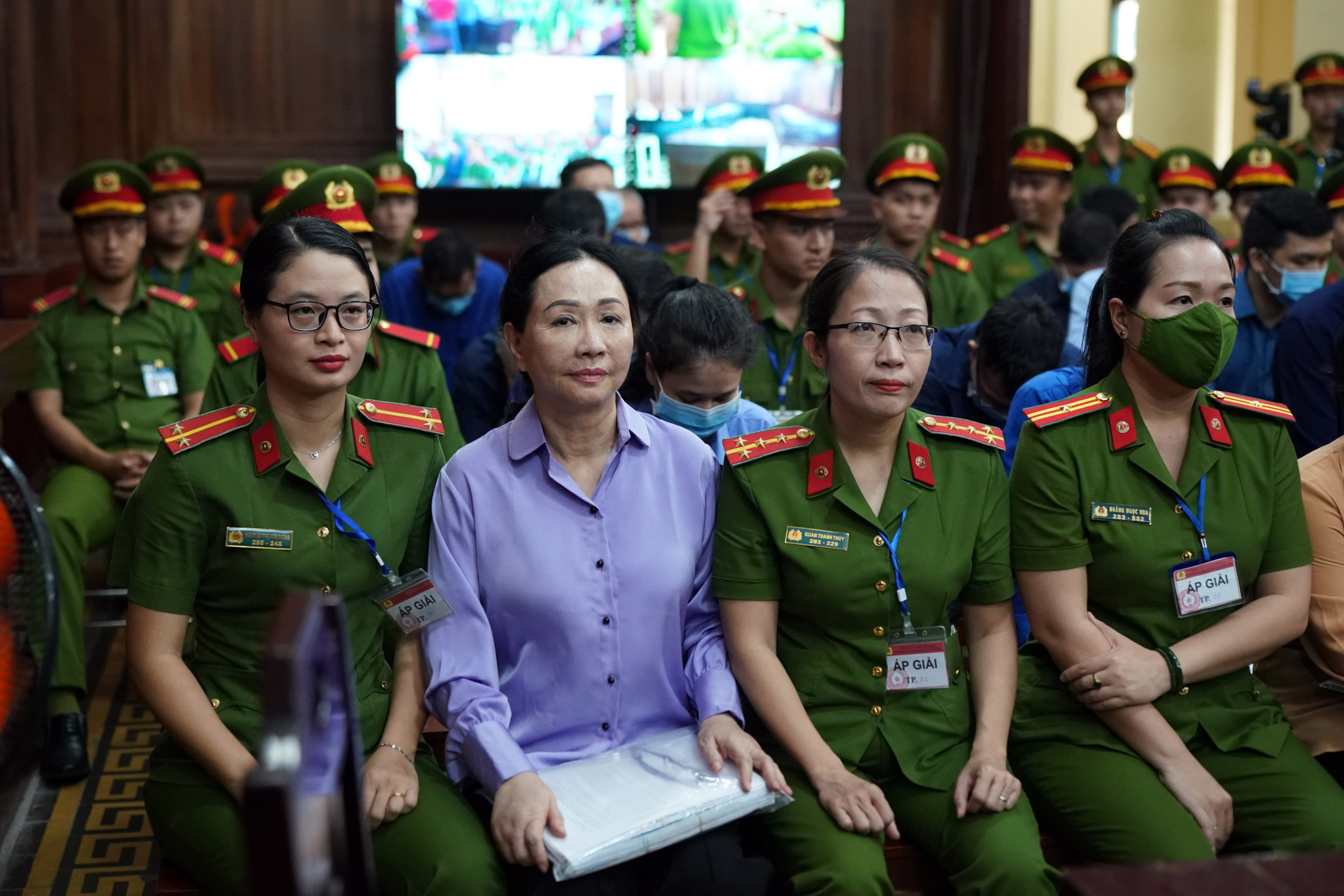 epa11203320 Truong My Lan (2-L), chairwoman of Van Thinh Phat Holdings, sits during her trial at the Ho Chi Minh City People's Court in Ho Chi Minh City, Vietnam, 07 March 2024. Lan is on trial over an accusation of fraud amounting to 12.5 billion US dollar, Vietnam?s largest fraud case.  EPA/STRINGER