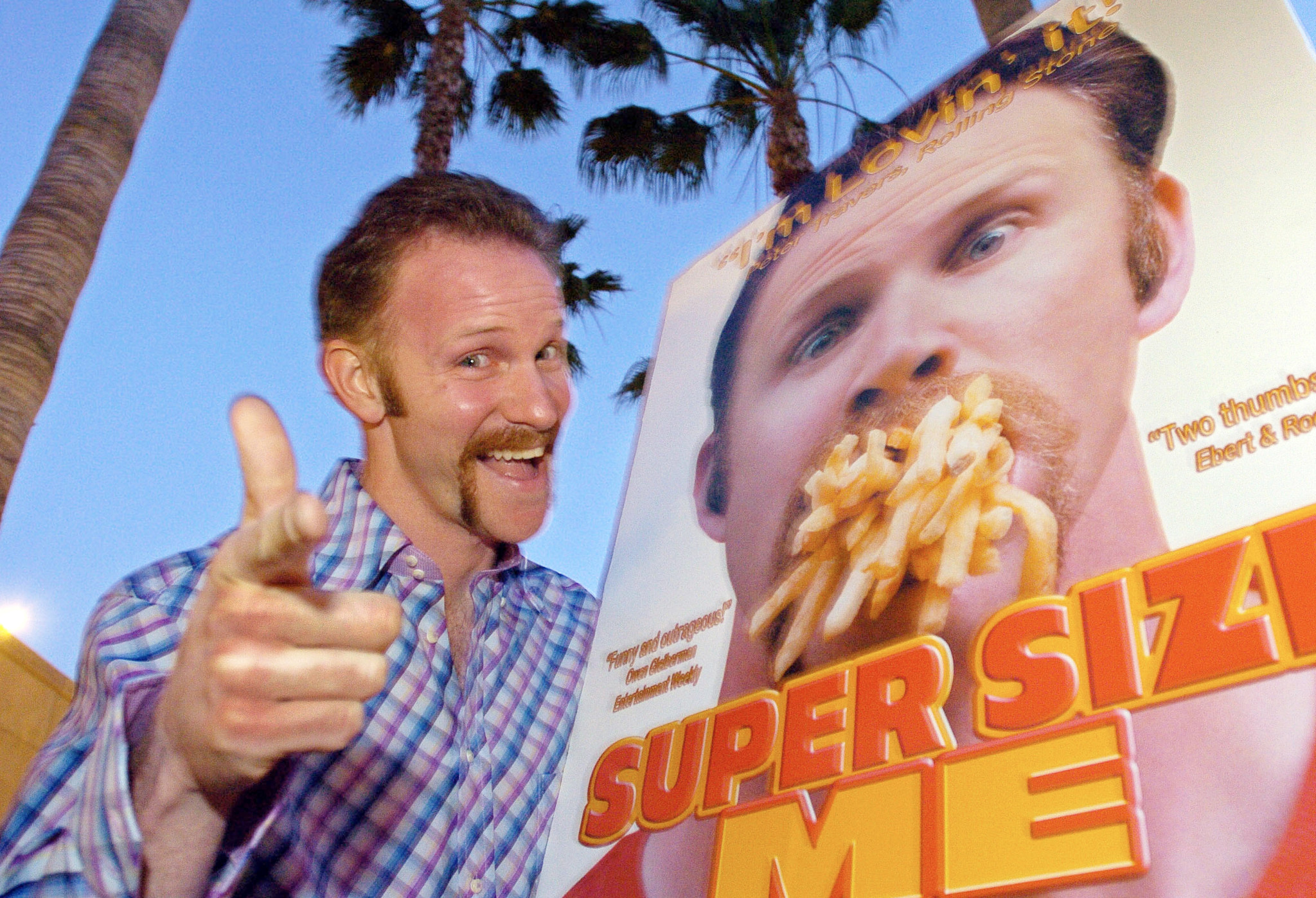 FILE - Morgan Spurlock poses at the Los Angeles premiere of his film "Super Size Me," Thursday night, April 22, 2004, in the Hollywood section of Los Angeles. Spurlock, an Oscar-nominee who made food and American diets his life?s work, famously eating only at McDonald?s for a month to illustrate the dangers of a fast-food diet, has died. He was 53. (AP Photo/Mark J. Terrill)