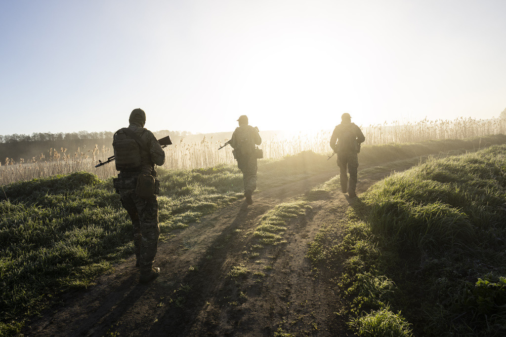 Ukrainian Border Guard soldiers participate in a military exercise in central Ukraine, Tuesday, May 2, 2023. Ahead of the much-anticipated Ukrainian counter-offensive, newly formed military assault units train in the country's dense forests. (AP Photo/Bernat Armangue)