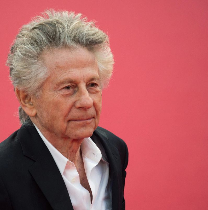 (FILES) Le réalisateur franco-polonais et ancien président du jury, Roman Polanski, arrive sur le tapis rouge du 45e Festival du film américain de Deauville, à Deauville, dans le nord de la France, le 7 septembre 2019. La décision du procès en appel du cinéaste franco-polonais Roman Polanski, 91 ans, poursuivi en diffamation par l'actrice britannique Charlotte Lewis après qu'elle l'a accusé de l'avoir violée dans les années 1980 alors qu'elle était adolescente, sera rendue le 4 décembre 2024. (Photo Loic VENANCE / AFP)