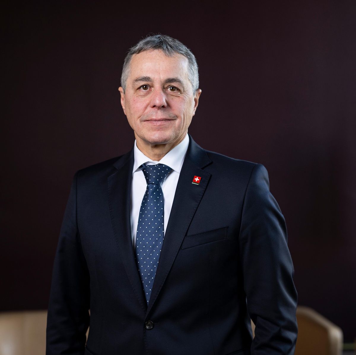 Ignazio Cassis en costume sombre avec cravate bleue, photographié à Berne le 17 décembre 2024.