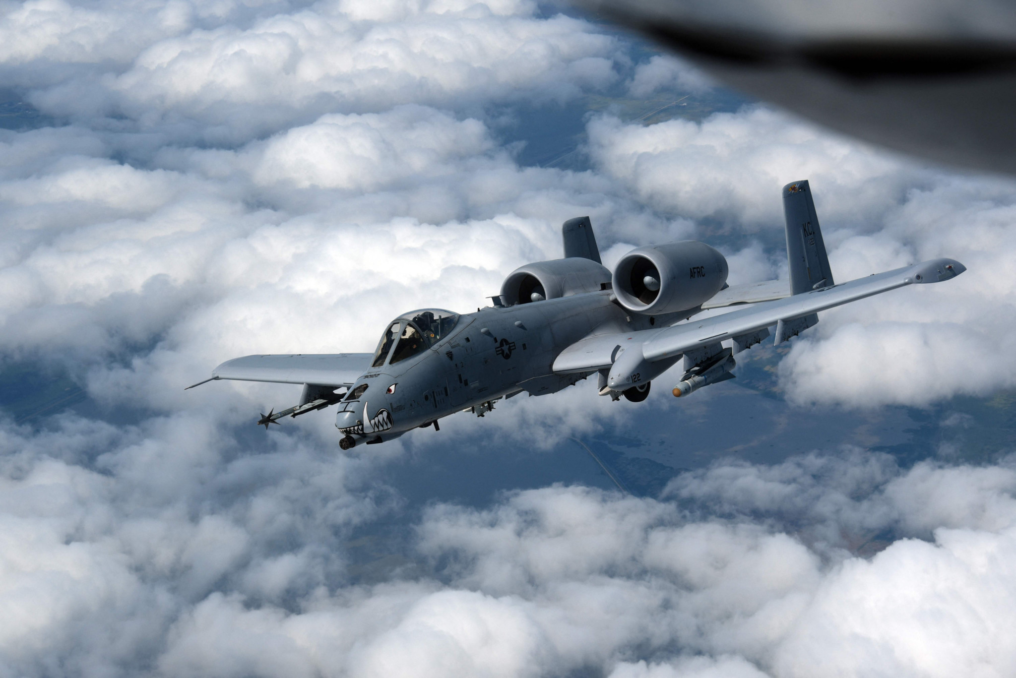 A US Air Force A-10 Thunderbolt II, also known as the “Warthog,” flies above cloud cover near the Iowa-Missouri border.