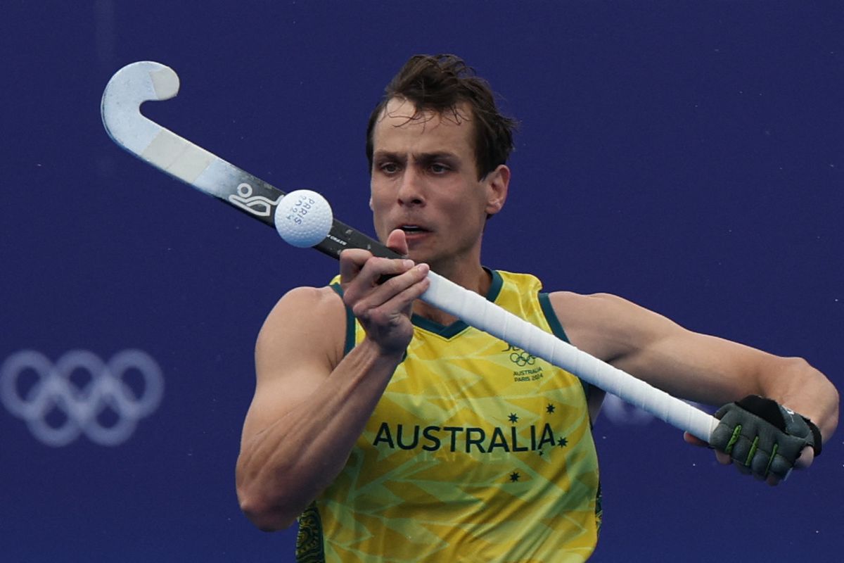 Australia's forward #02 Thomas Craig controls the ball in the men's pool B field hockey match between Australia and Argentina during the Paris 2024 Olympic Games at the Yves-du-Manoir Stadium in Colombes on July 27, 2024. (Photo by Ahmad GHARABLI / AFP)