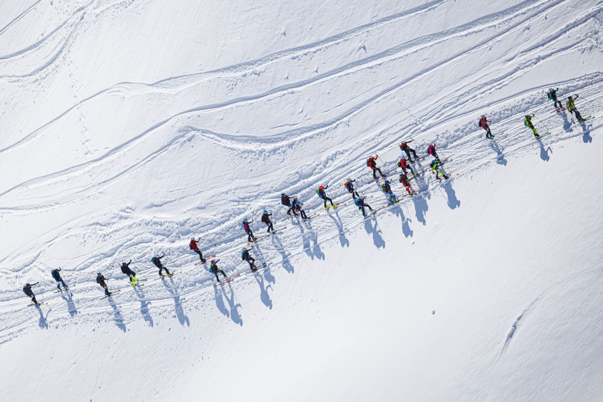 Competitors climb the Rosablanche peak (3191m at the highest point crossed) during the 22nd Glacier Patrol race in the mountains between Zermatt and Verbier, Switzerland, Thursday, April 28, 2022. The Glacier Patrol (Patrouille des Glaciers in French), organized by the Swiss Army, takes place during between April 25 and May 1. Highly-experienced hiker-skiers trek over a distance of 57,5km (4386m ascent and 4519m descent) on the Haute Route along the Swiss-Italian border from Zermatt to Verbier. (KEYSTONE/Valentin Flauraud)