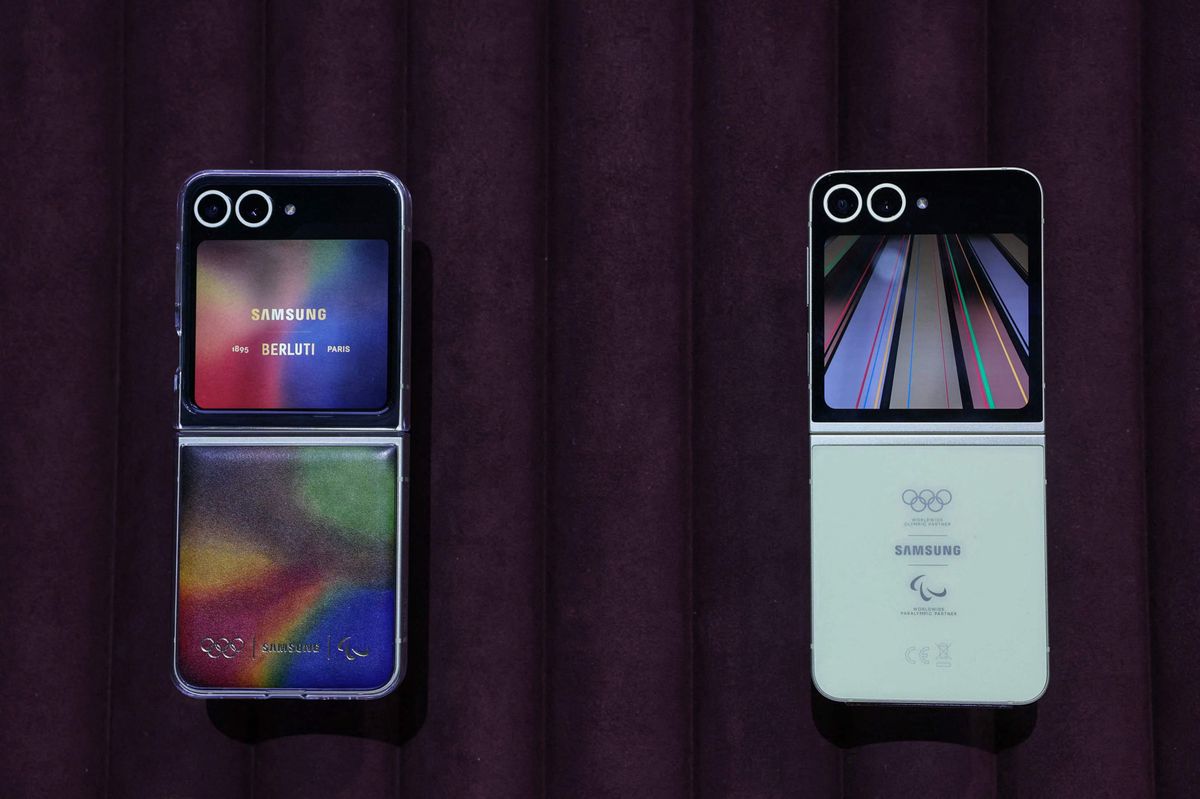 A display shows the Galaxy Z FLip6 Olympic Edition mobile phones during the Samsung Galaxy Unpacked event to unveil the next generation of Artificial Intelligent (AI) powered Galaxy phones at the Carrousel du Louvre shopping mall in Paris on July 10, 2024. (Photo by EMMANUEL DUNAND / AFP)