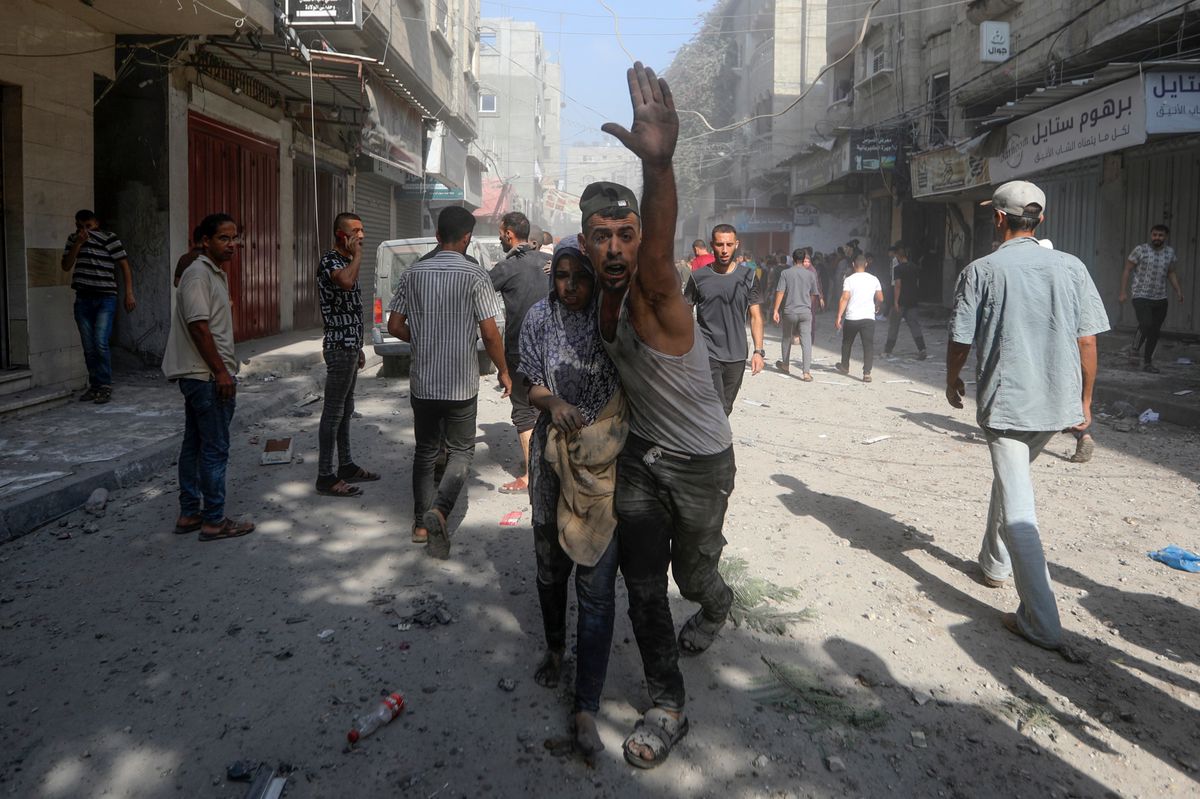 Palestinians evacuate wounded people following an Israeli airstrike in Bureij refugee camp, Gaza Strip, Thursday, Nov. 2, 2023. (AP Photo/Mohammed Dahman)