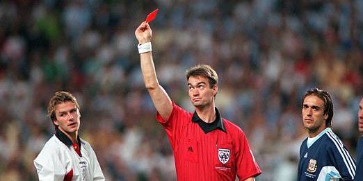 World Cup 1998 Finals, St, Etienne, France, 30th June, 1998, England 2 v Argentina 2 (Argentina win 4-3 on penalties), Referee Kim Milton Nielsen sends off England's David Beckham for kicking out at Diego Simeone (Photo by Bob Thomas Sports Photography via Getty Images)