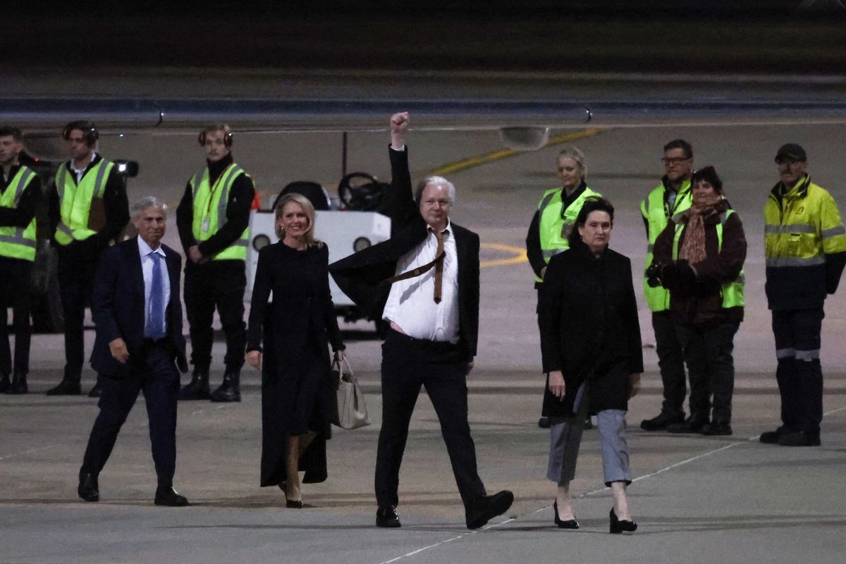 Julian Assange arrives at Canberra Airport on June 26, 2024.
