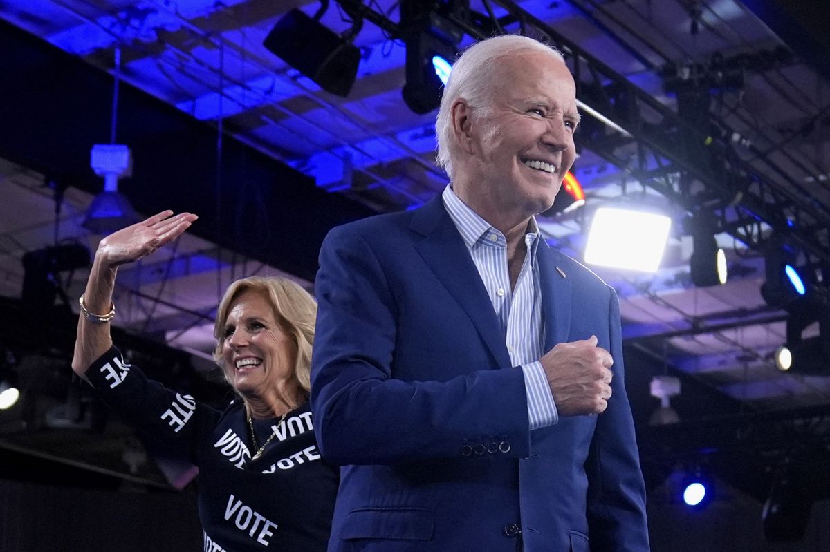 Raleigh home game: Joe Biden and his wife Jill greet the crowd at a campaign event. 
