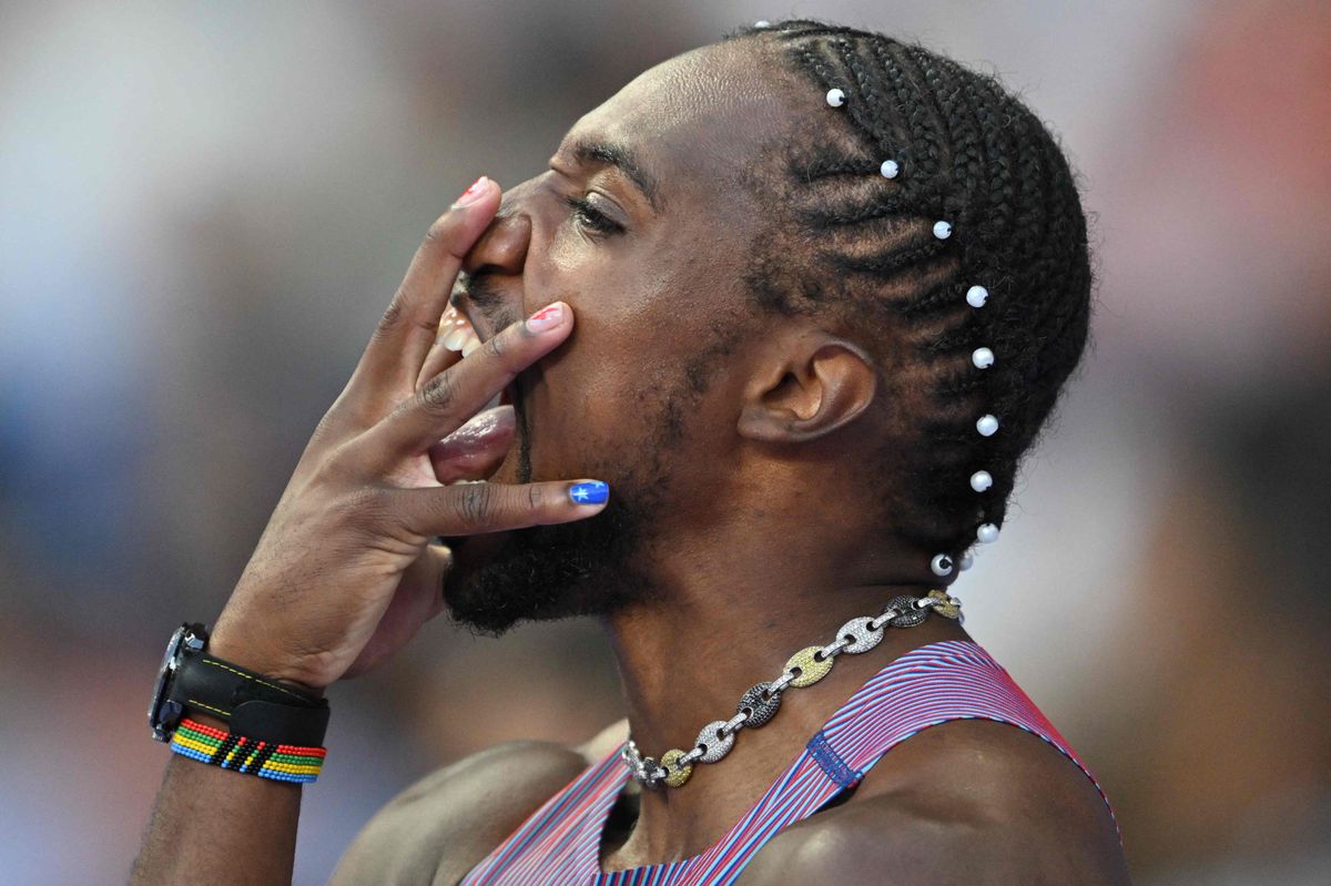 US' Noah Lyles reacts as he prepares to compete in the men's 100m semi-final of the athletics event at the Paris 2024 Olympic Games at Stade de France in Saint-Denis, north of Paris, on August 4, 2024. (Photo by Andrej ISAKOVIC / AFP)
