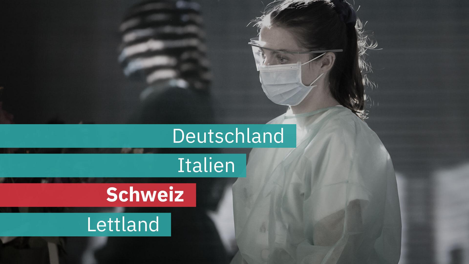 Erschöpft von einer langen Schicht: Eine Pflegerin im Gespräch mit einer Covid-19-Patientin im Kantonsspital Fribourg.