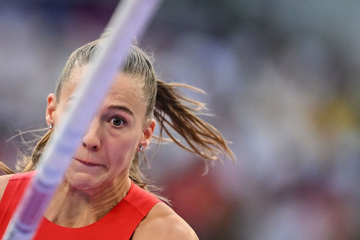 Switzerland's Angelica Moser competes in the women's pole vault final of the athletics event at the Paris 2024 Olympic Games at Stade de France in Saint-Denis, north of Paris, on August 7, 2024. (Photo by Andrej ISAKOVIC / AFP)