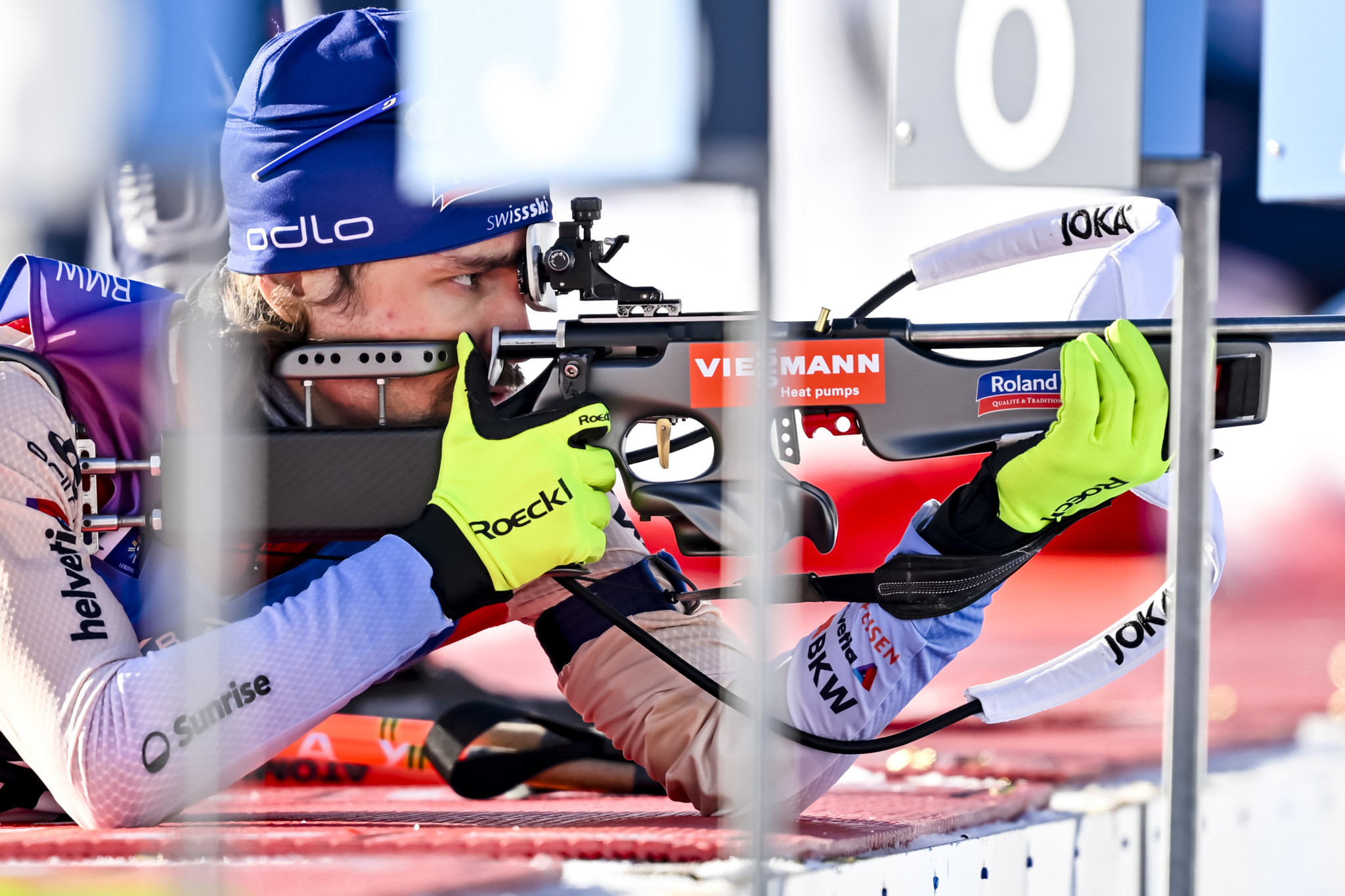 Jeremy Finello of Switzerland competes at the shooting range during the men's 10 km sprint race at the IBU Biathlon World Cup, on Friday, December 15, 2023, in Lenzerheide, Switzerland. (KEYSTONE/Gian Ehrenzeller)