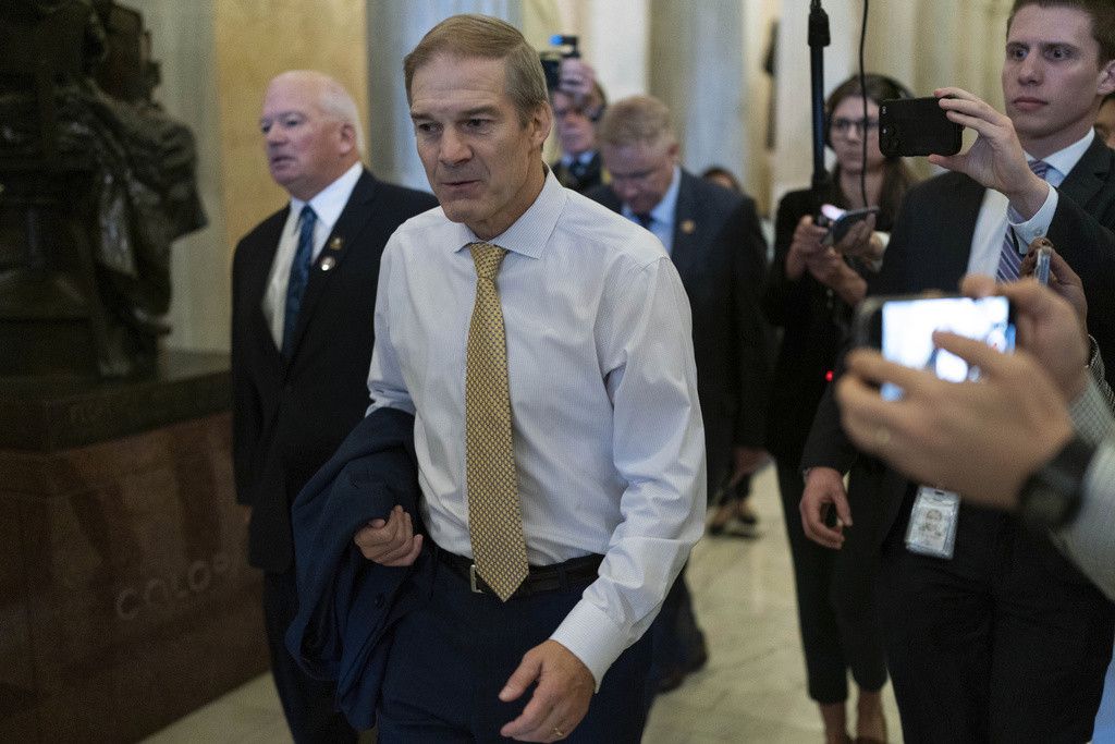 Rep. Jim Jordan, R-Ohio, chairman of the House Judiciary Committee is followed by reporters as he walks to his office at the Capitol in Washington, Tuesday, Oct. 17, 2023. (AP Photo/Jose Luis Magana).Jim Jordan