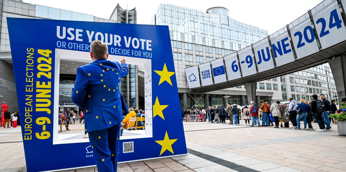epa11317717 A man wearing a suit of EU flag attends the open days of European institutions on 'Europe Day' in Brussels, Belgium, 04 May 2024. Thousands of visitors attended the Europe Day, an annual celebration of peace and unity in Europe, that falls this year a month ahead to the European elections to renew members of the European Parliament  EPA/FREDERIC SIERAKOWSKI