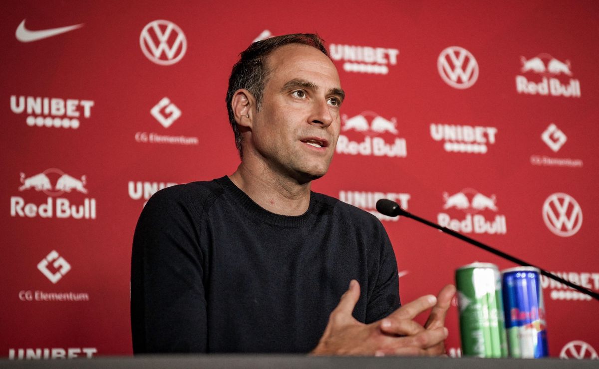 This handout photo taken and released by German first division Bundesliga football club RB Leipzig on April 27, 2021 shows RB Leipzig's CEO Oliver Mintzlaff speaking during a press conference with outgoing coach Julian Nagelsmann (not in picture) in Leipzig, eastern Germany. - Nagelsmann is replacing Hansi Flick as head coach of German Bundesliga record club FC Bayern Munich. (Photo by Handout / RB LEIPZIG / AFP) / RESTRICTED TO EDITORIAL USE - MANDATORY CREDIT "AFP PHOTO / RB LEIPZIG" - NO MARKETING - NO ADVERTISING CAMPAIGNS - DISTRIBUTED AS A SERVICE TO CLIENTS