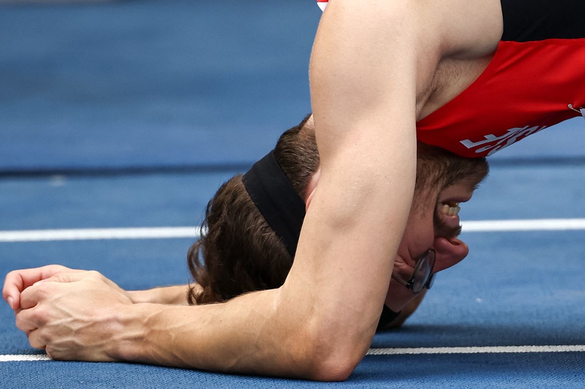 Switzerland's Dany Brand reacts during the men's 400m hurdles heat during the European Athletics Championships at the Olympic stadium in Rome on June 9, 2024. (Photo by Anne-Christine POUJOULAT / AFP)