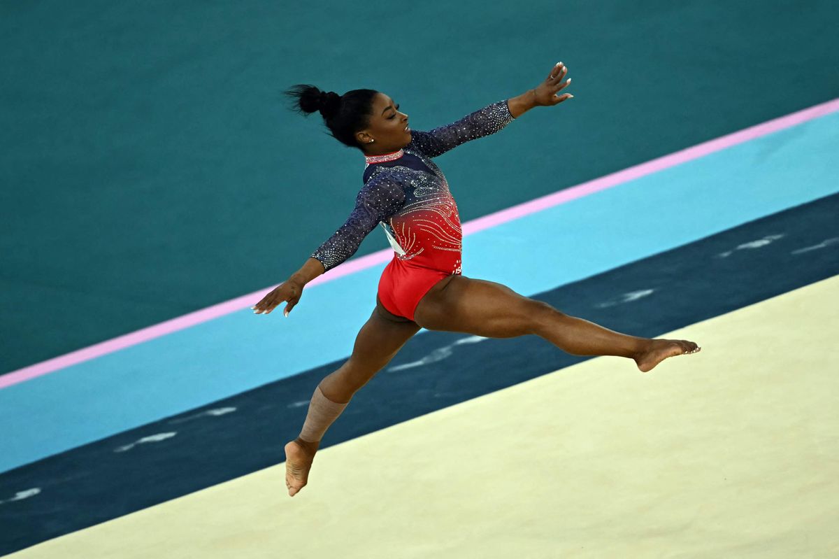 US' Simone Biles competes in the artistic gymnastics women's floor exercise final during the Paris 2024 Olympic Games at the Bercy Arena in Paris, on August 5, 2024. (Photo by Paul ELLIS / AFP)