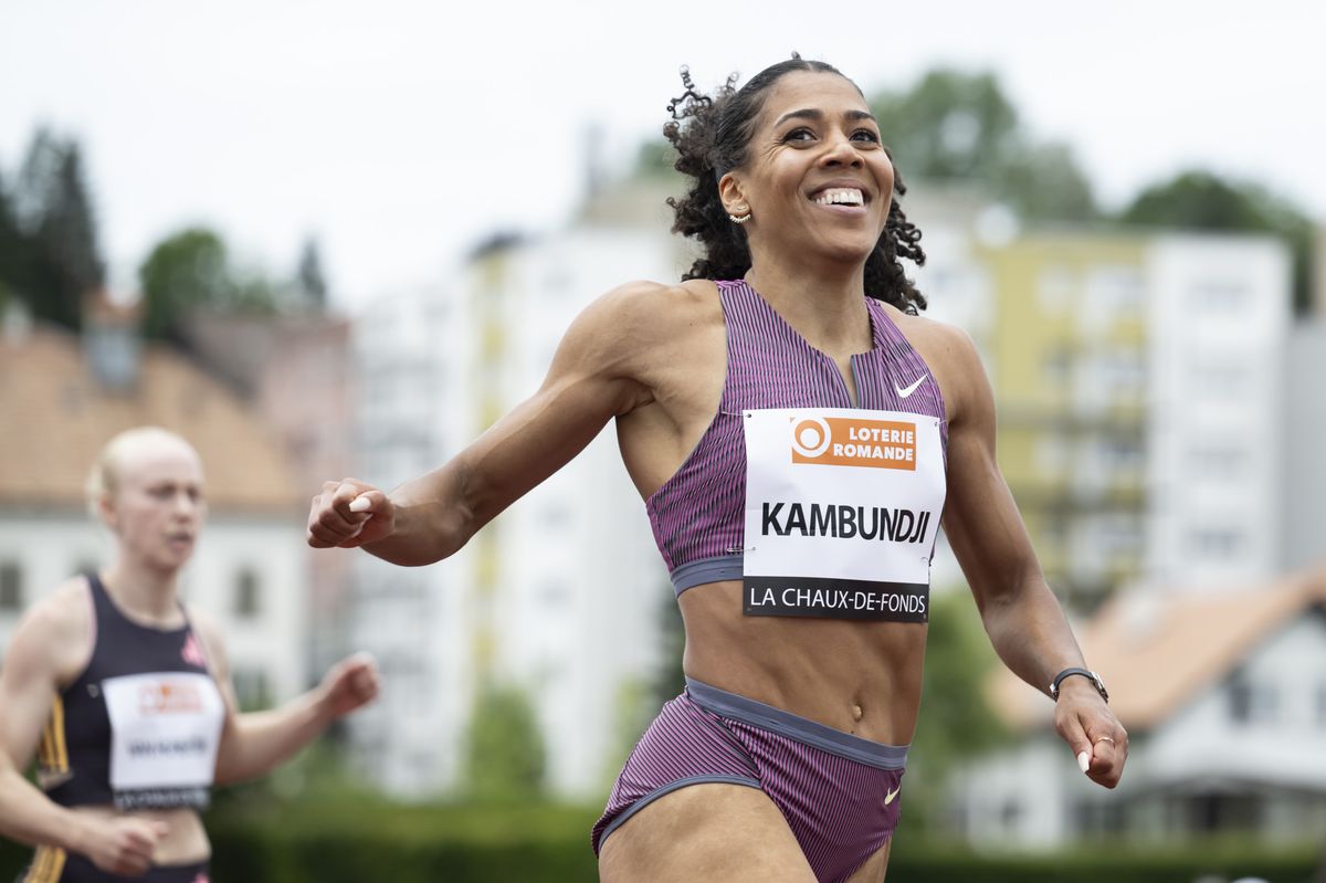Mujinga Kambundji of Switzerland reacts after crossing the finish line in the 100 metres Women Final, during the 44th edition of Resispint International, this Sunday, July 14, 2024, at the Stade de la Charriere, in La Chaux-de-Fonds. (KEYSTONE/Anthony Anex)