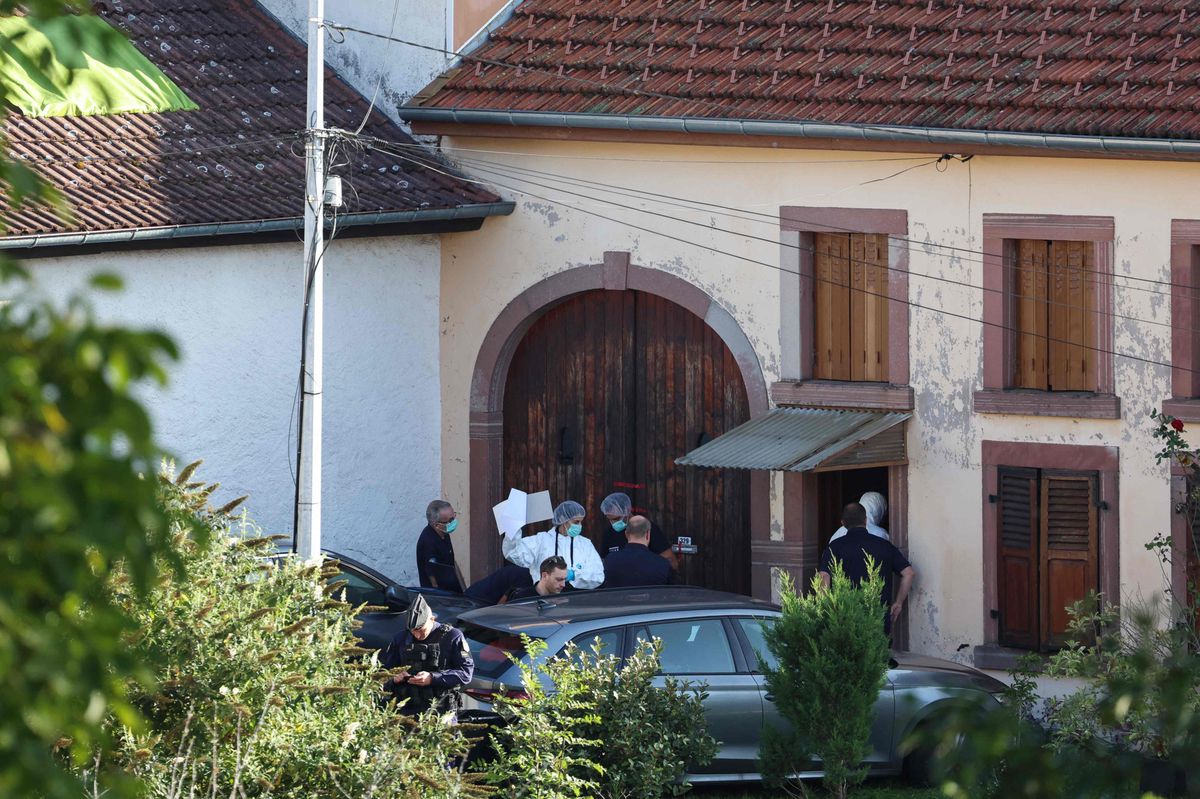 French gendarmes of the National Gendarmerie Criminal Research Institute (IRCGN) stand before a house during investigations in the village of Diespach, eastern France on October 1, 2023 following the disappearance of Lina, a 15-year old girl who went missing on September 23, 2023 in the area of the Saint-Blaise-la-Roche village, eastern France. (Photo by FREDERICK FLORIN / AFP)