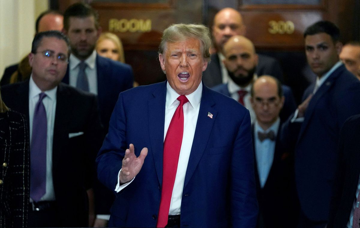 Former US President Donald Trump speaks to the press as he departs the New York State Supreme Court during the civil fraud trial against the Trump Organization, in New York City on January 11, 2024. Trump's legal team will deliver closing arguments January 11 in the fraud case after the judge barred the former president from using the trial finale as an election campaign grandstand. (Photo by TIMOTHY A. CLARY / AFP)